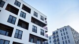 Fototapeta Miasto - Modern apartment building in sunny day. Exterior, residential house facade.