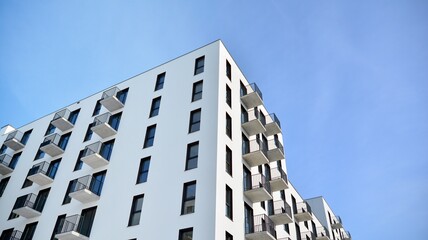 Modern apartment building in sunny day. Exterior, residential house facade.