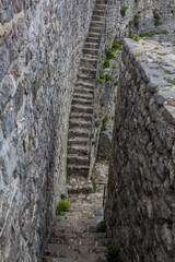 Wall Mural - Fortress wall stairs at an ancient settlement Stari Bar, Montenegro