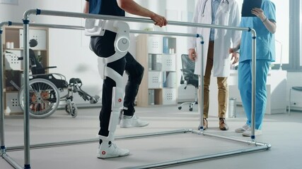 Aufkleber - Modern Hospital Physical Therapy: Patient with Injury Walks Wearing Advanced Robotic Exoskeleton. Physiotherapy Rehabilitation Scientists, Engineers Help Disabled Person. Focus on Legs