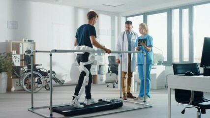 Aufkleber - Modern Hospital Physical Therapy: Patient with Injury Walks on Treadmill Wearing Advanced Robotic Exoskeleton. Physiotherapy Rehabilitation Scientists, Engineers, Doctors Help Disabled Person