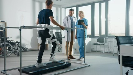 Aufkleber - Modern Hospital Physical Therapy: Patient with Injury Walks on Treadmill Wearing Advanced Robotic Exoskeleton. Physiotherapy Rehabilitation Scientists, Engineers, Doctors use Tablet Computer to Help