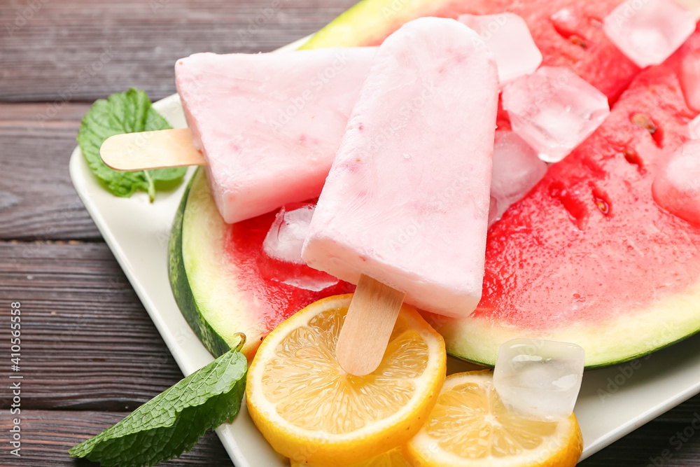 Composition with watermelon ice cream on wooden background