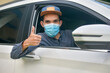 © Suriyo - Asian man wear medical mask sitting in car to protect coronavirus covid19 ,Mask prevent PM2.5