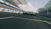 Dynamic High Angle Drone Shot Of Camera Passing Several Generic Formula One Race Cars Racing Along The Homestretch Over The Finish Line – Realistic High Quality 3d Animation