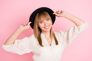 Photo of cute pretty lady toothy smile look camera wear retro headwear dotted blouse isolated pink color background