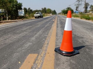 Wall Mural - Road construction blur And the rubber cone is located in front