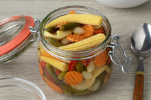 Glass Jar With Homemade Pickled Vegetable Mix Close Up
