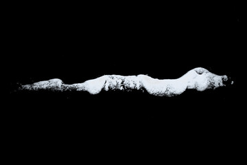 Poster - white snow isolated on a black background. Winter elements for design