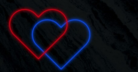 Sticker - Animation of interlocked red and blue neon hearts flashing on black background