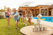 © Impact Photography - Friends playing knock down tin cans game