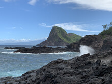 Coastline View Of The Volcanic Rocks In The Ocean Splashing At The Cove On The Island Of Maui Hawaii