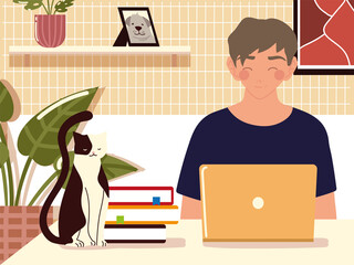 Wall Mural - home working, young man using laptop books and cat on desk