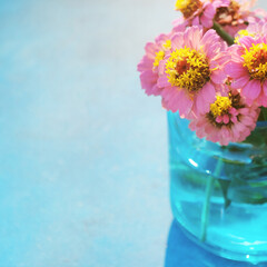 Poster - Light and airy Zinnia flower bouquet, fresh flowers for spring season background with copy space.
