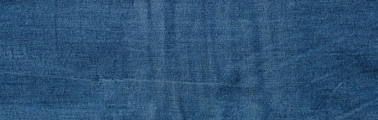 Wall Mural - texture of blue jeans denim fabric background