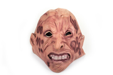 Halloween rubber mask on a white background