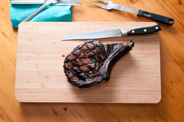 Poster - rib steak grilled to perfection on a grill