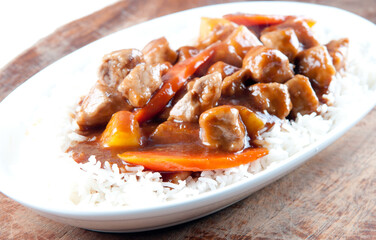 Wall Mural - home made sweet and sour pork on white rice