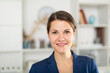 © JackF - Portrait of young elegant confident smiling businesswoman in modern office ..
