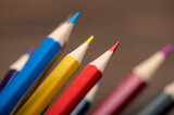 Fototapeta Las - A few colored pencils. Close-up, selective focus.