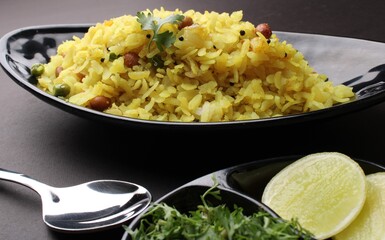 Indian Breakfast aalu Poha Also Know as kande Pohe made up of Beaten Rice or Flattened Rice.