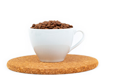 A cup of coffee beans isolated on a white background.