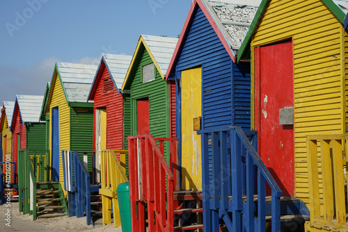 Panoramic View Of Beach Huts Against Buildings