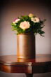 Bouquet of flowers in a vase on antique 