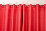 Fototapeta  - Closed red theater curtain, silk background.