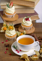 Sticker - Autumn and winter baked pastries. Healthy muffins with traditional fall spices With tea cup. White marble table, copy space