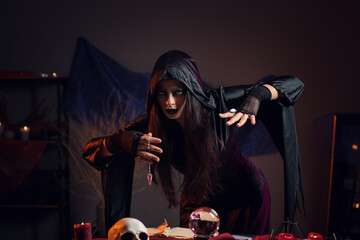 Witch performing black magic ritual