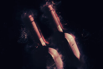 Wall Mural - Red wine bottles on black background Concept of fine wine Food and beverage