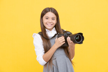 Poster - cheerful child girl take photo with digicam, photography