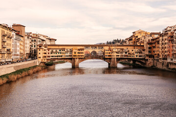 Poster - Famous bridge Ponte Vecchio over Arno river in Florence, Italy (Vintage photo effect)