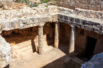 Wall Mural - Tombs of the Kings near  Paphos Cyprus a 4th century BC necropolis, of burial chambers of the Roman Hellenic which is a popular tourist travel destination attraction landmark, stock photo image