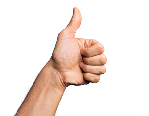 Wall Mural - Hand of caucasian young man showing fingers over isolated white background doing successful approval gesture with thumbs up, validation and positive symbol