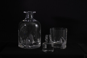 Sticker - Luxury set of a jar and glass isolated on a black background