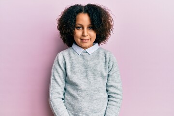 Poster - Young little girl with afro hair wearing casual clothes with a happy and cool smile on face. lucky person.