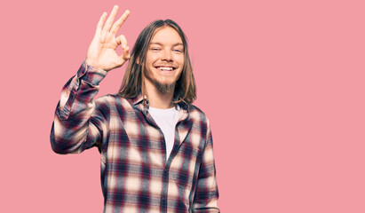 Sticker - Handsome caucasian man with long hair wearing hipster shirt smiling positive doing ok sign with hand and fingers. successful expression.