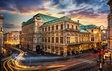 Vienna State Opera. Veinna, Austria. Evening View. The Historic Opera House Is A Symbol And Landmark Of The City Of Vienna.  Panoramic View, Long Exposure.