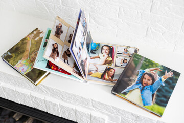 Wall Mural - the photo album is decorated in a beautiful photobook. Presented on a white background