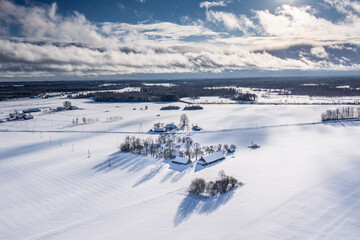 landscape with snow covered field in countryside