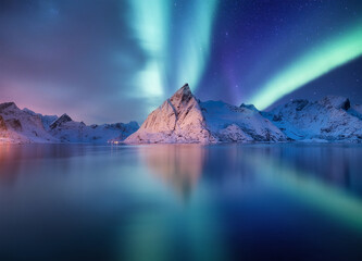 Wall Mural - stars and northern light. aurora borealis. hamnoy village, lofoten islands, norway. glow on sky. nat
