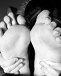 © Pascal Huot - Les pieds d'un enfant