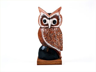 Red Owl Tyto soumagnei wooden handmade souvenir isolated on white background