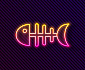 Poster - Glowing neon line Fish skeleton icon isolated on black background. Fish bone sign. Vector.