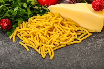 Italian pasta raw Maccheroni for cooking