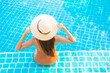 © siraphol - Portrait beautiful young asian woman relax smile leisure around outdoor swimming pool