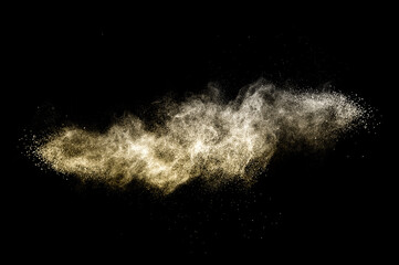 Wall Mural - golden powder splash for makeup artist or graphic design in black background