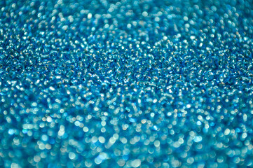 Shiny blue beads close up